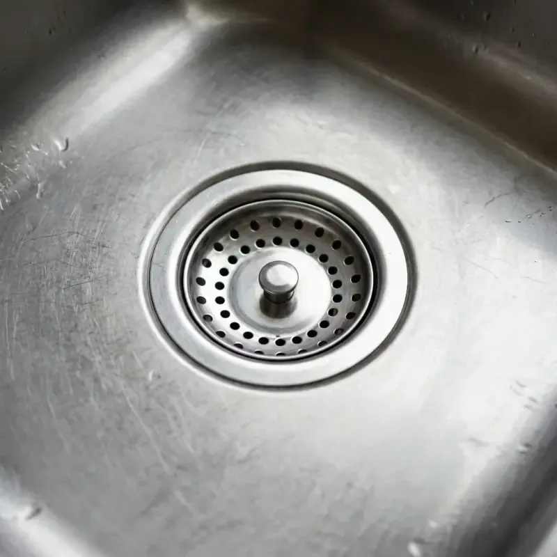 Certified plumbing technician performing same-day Drain Cleaning & Hydro-Jetting service and installation